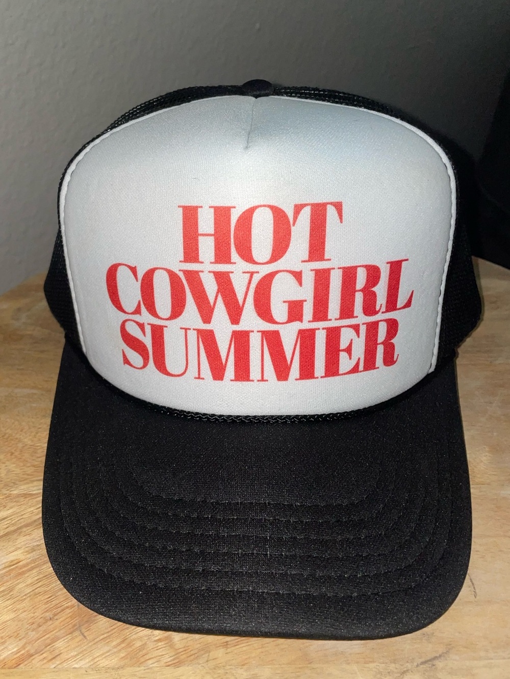 Black and White Trucker Cap with Red Font